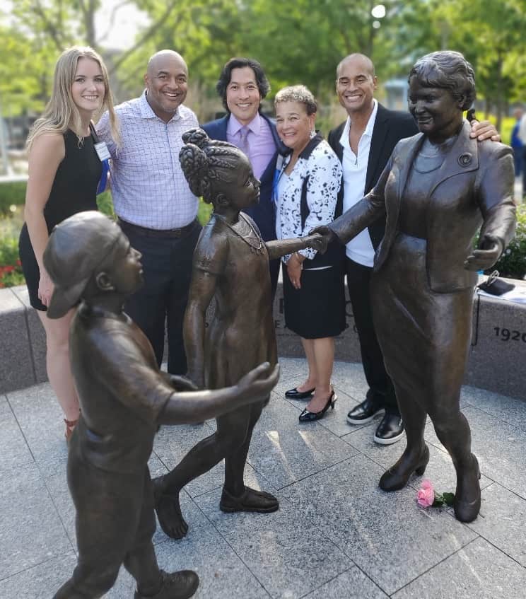 Anderson family with Marian Spencer statue