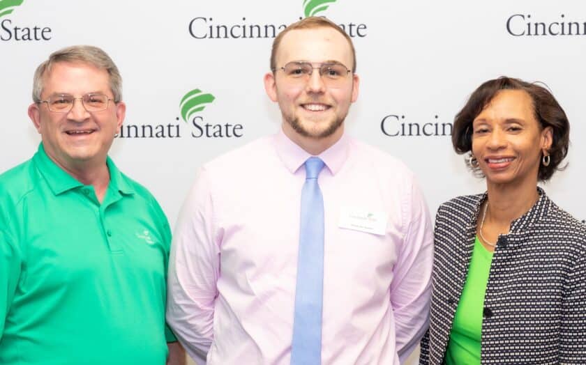 Co-op Coordinator Adam Waits, Co-op Student of the Year Alex “AJ” Hunter, and President Monica Posey