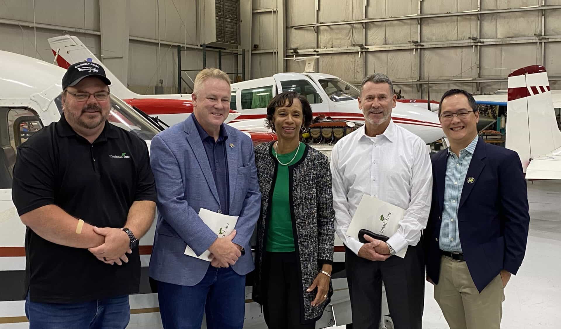 Jeff Wright (Program Chair, Aviation Maintenance Technology), Congressman Warren Davidson, President Monica Posey, John Silverman (Board of Trustees Chairperson), Justin Howe (Board of Trustees member)