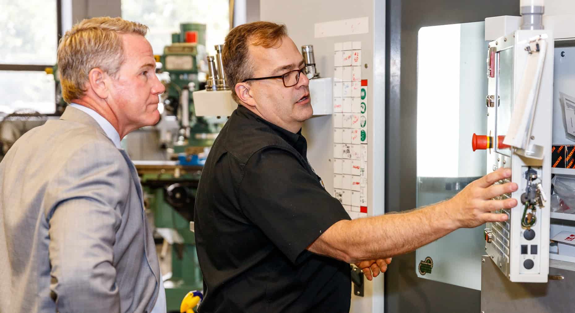 Mechanical Engineering Technology (MET) faculty member Matt Spetz described tools students use to Sen. Husted - 8-12-25