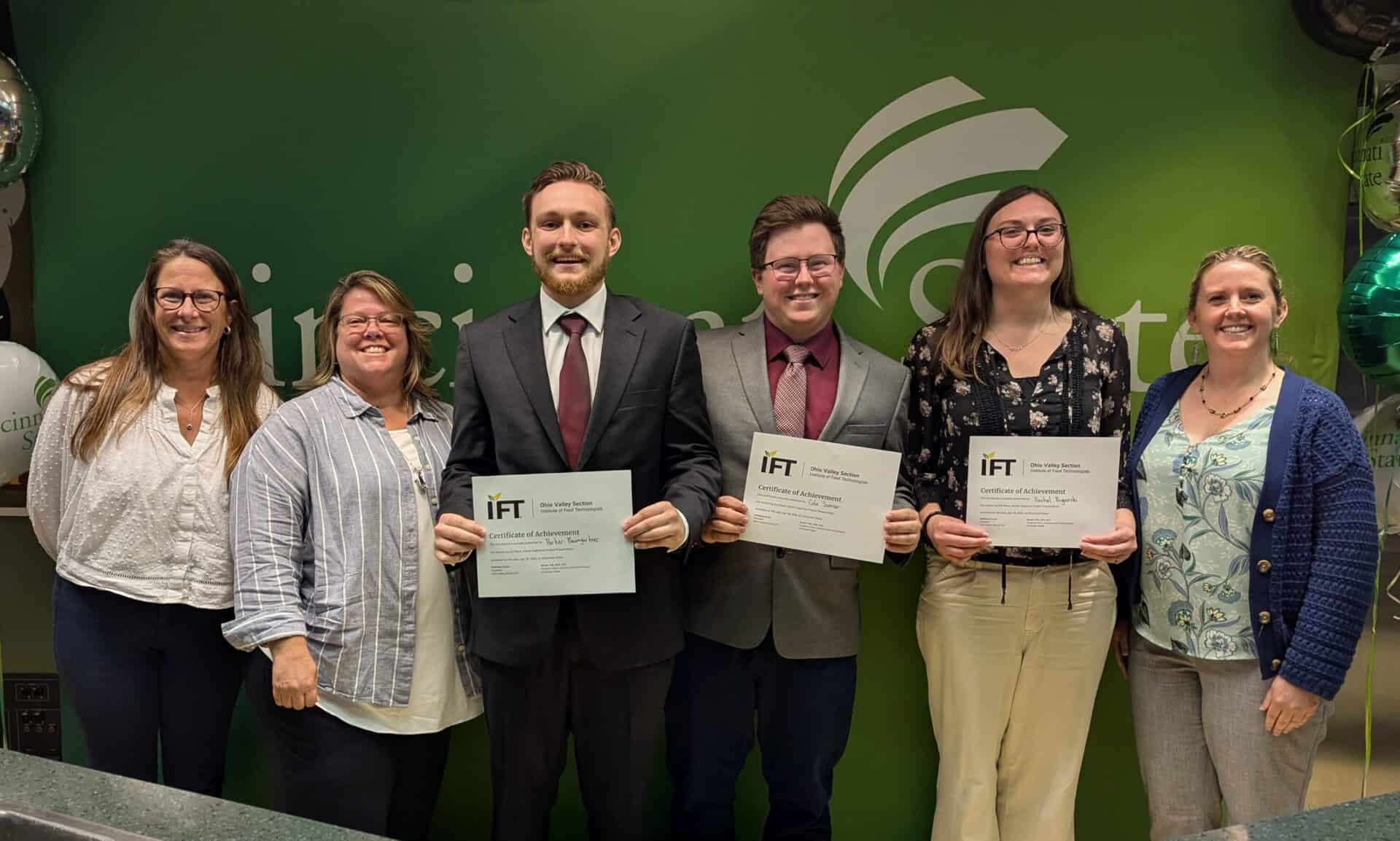 CFS Capstone students Parker Baumgartner, Cole Sumner, and Rachel Buganski with Board members of the Ohio Valley Institute of Food Technologists
