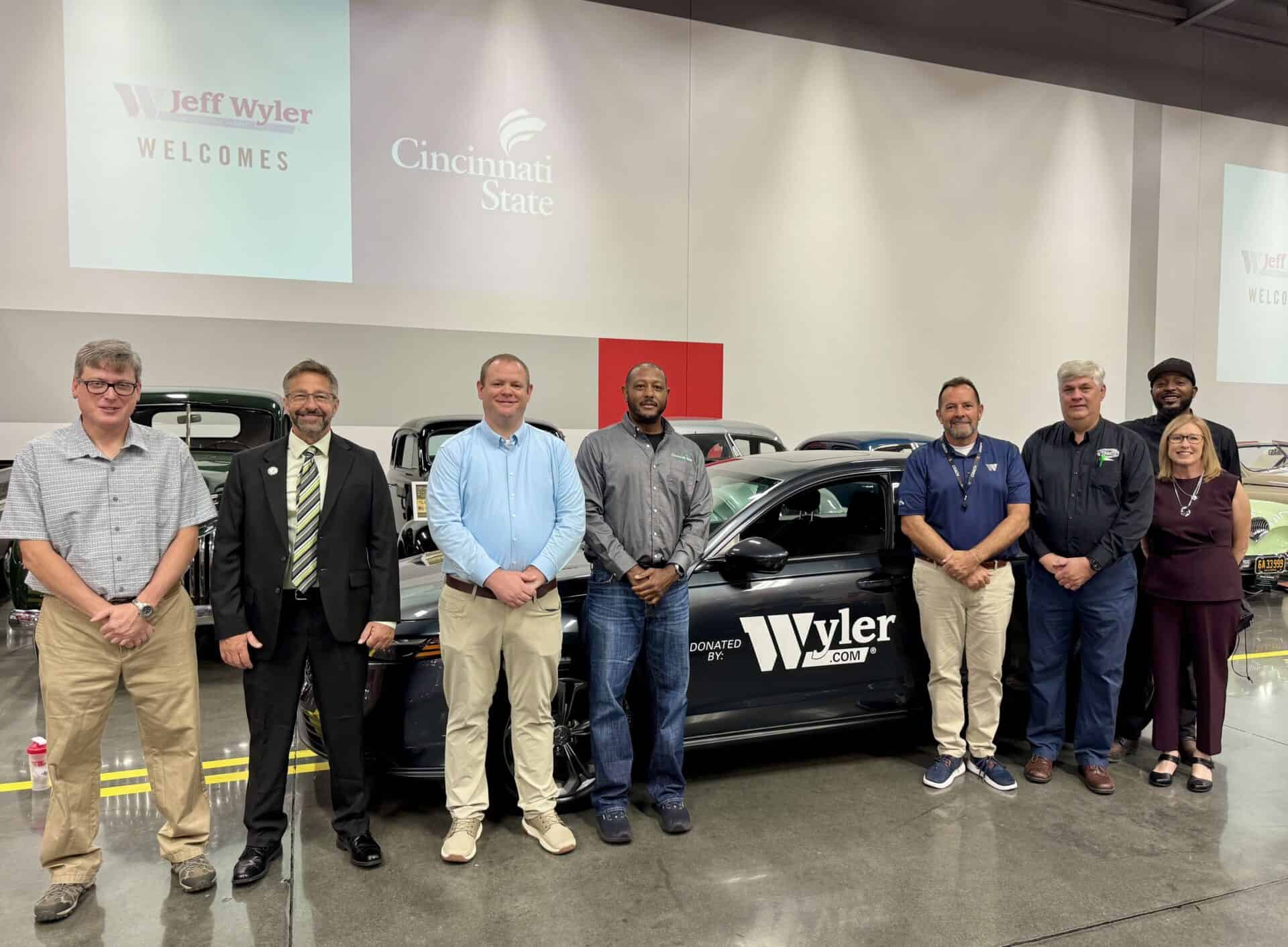 Cincinnati State and Jeff Wyler Automotive Family representatives at the presentation of the donated car